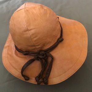 WILSONS 💯 leather, gold/ brown color Hat